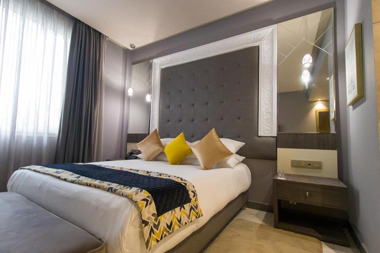 Mandarin Palace Hotel&Spa Tanger Exterior foto A bedroom at the hotel